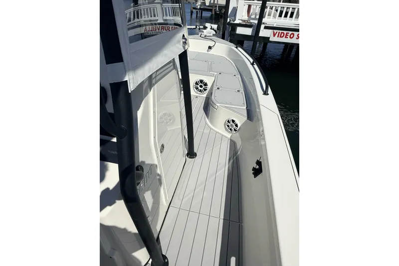 Slide: The Image of 2023 Pathfinder 2600 TRS boat deck with sleek design and modern features. - 12