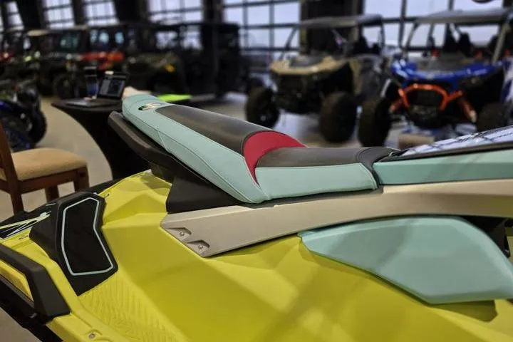 Slide: The Image of 2025 Yamaha WaveRunner JetBlaster PRO 3-Up in showroom, showcasing sleek design and vibrant colors. - 11