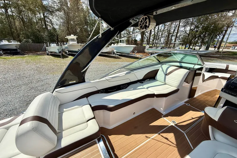 Slide: The Image of 2016 Regal 2300 Bowrider interior with luxurious seating and sleek design. - 14