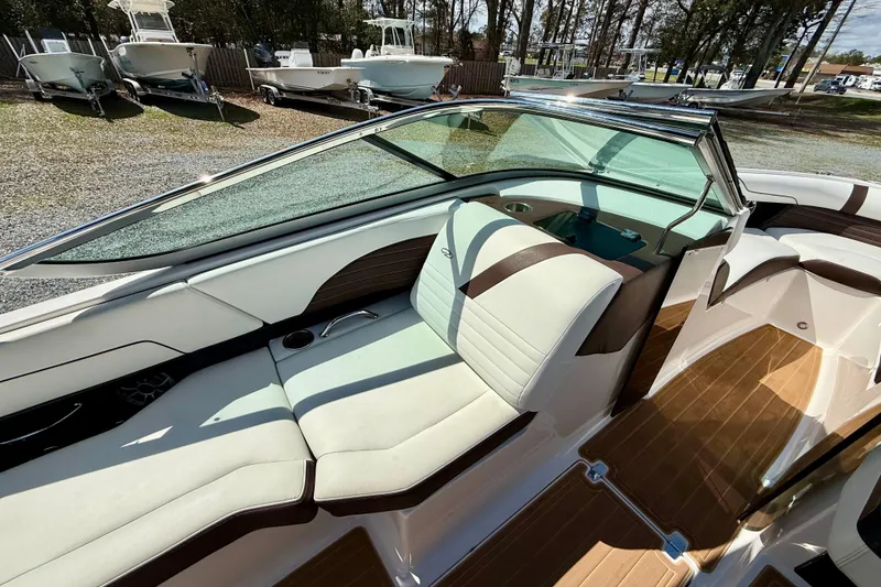 Slide: The Image of 2016 Regal 2300 Bowrider interior with sleek seating and modern design. - 17