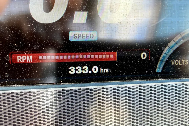 Slide: The Image of Dashboard display of a 2016 Regal 2300 Bowrider showing 333.0 engine hours. - 21