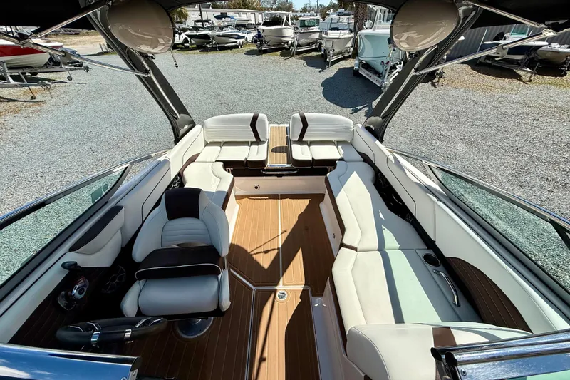 Slide: The Image of 2016 Regal 2300 Bowrider interior with spacious seating and sleek design. - 22