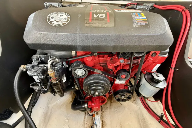Slide: The Image of 2016 Regal 2300 Bowrider V8 engine, detailed view with red and black components. - 25