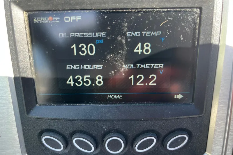 Slide: The Image of Dashboard of 2017 MasterCraft NXT22 showing oil pressure, engine temperature, hours, and voltage. - 12