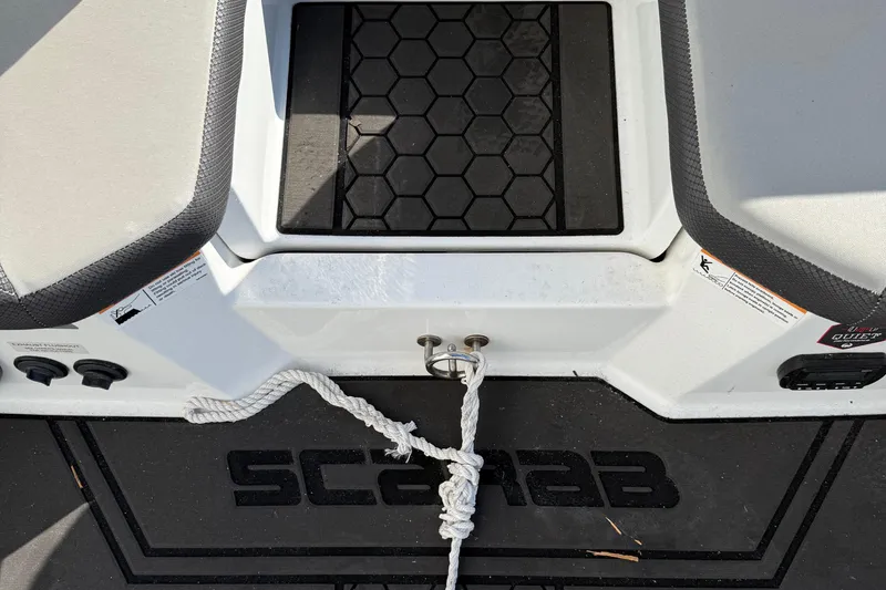 Slide: The Image of 2021 Scarab 255 ID boat interior with rope and hexagonal mat design. - 20