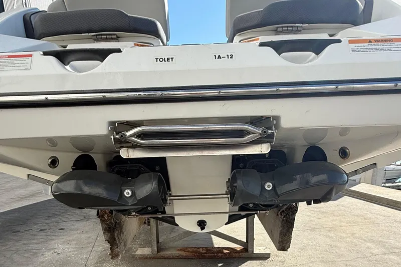 Slide: The Image of Rear view of 2021 Scarab 255 ID boat showing dual jet propulsion system. - 21