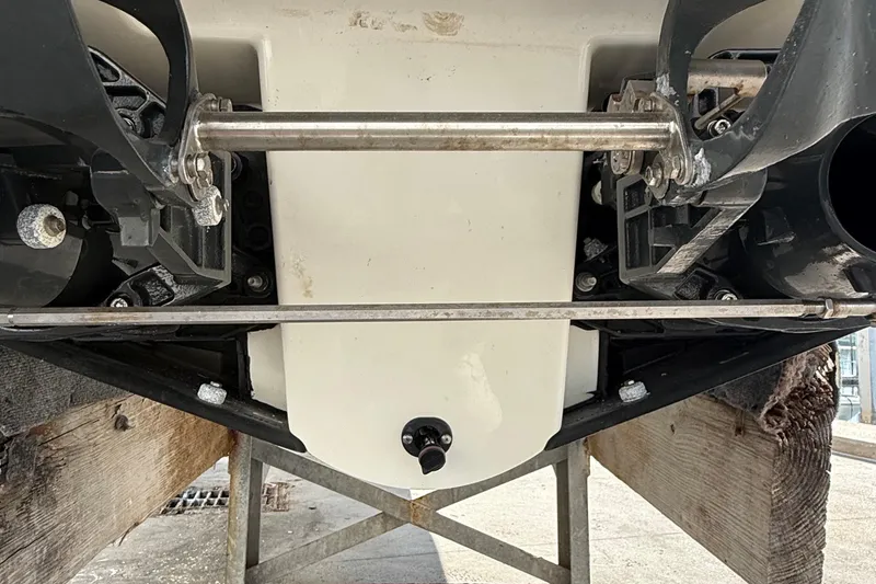 Slide: The Image of Underneath view of a 2021 Scarab 255 ID boat, showcasing its dual jet propulsion system. - 22