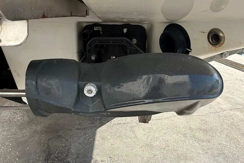 Slide: The Image of Close-up of a 2021 Scarab 255 ID boat component, showcasing its sleek design. - 24