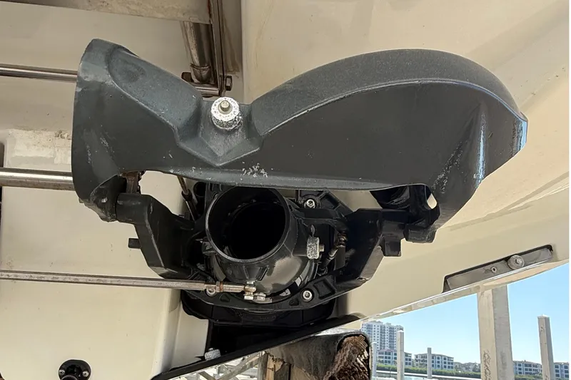 Slide: The Image of 2021 Scarab 255 ID boat engine component, close-up view, showcasing mechanical details. - 25