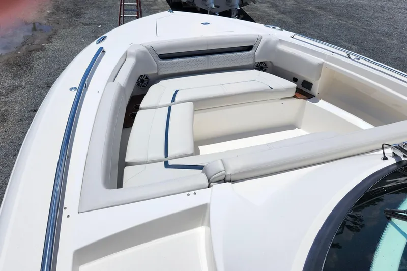 Slide: The Image of 2022 Tiara Yachts 38 LS boat with spacious white seating area. - 30