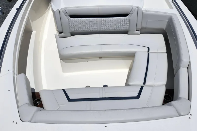 Slide: The Image of Luxurious seating area on 2022 Tiara Yachts 38 LS, featuring elegant white upholstery. - 32