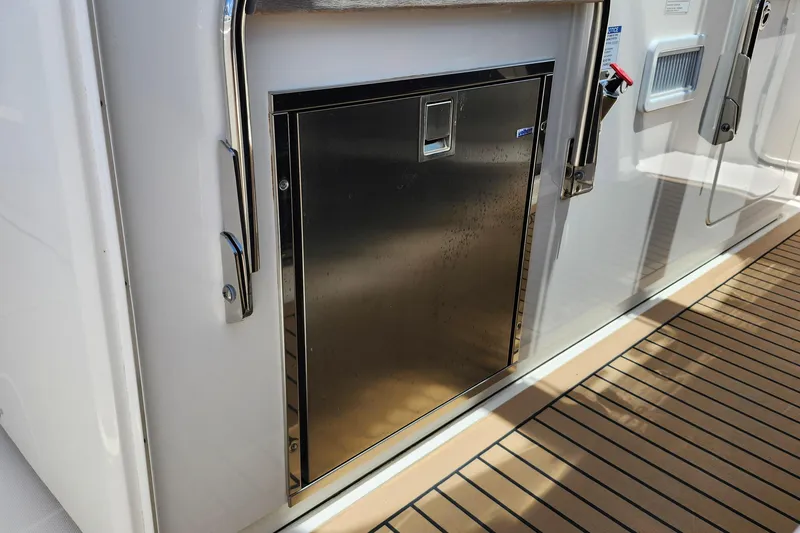 Slide: The Image of Stainless steel compartment on 2022 Tiara Yachts 38 LS deck. - 45