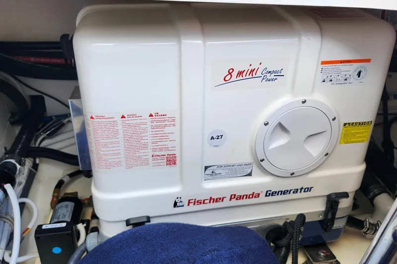 Slide: The Image of Fischer Panda generator in 2022 Tiara Yachts 38 LS, compact power unit installation. - 61