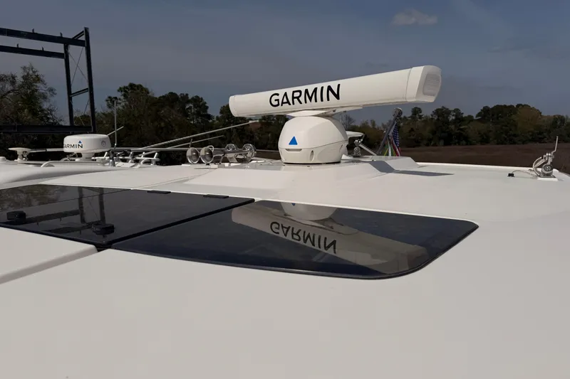 Slide: The Image of 2022 Tiara Yachts 38 LS with Garmin radar system on deck. - 8