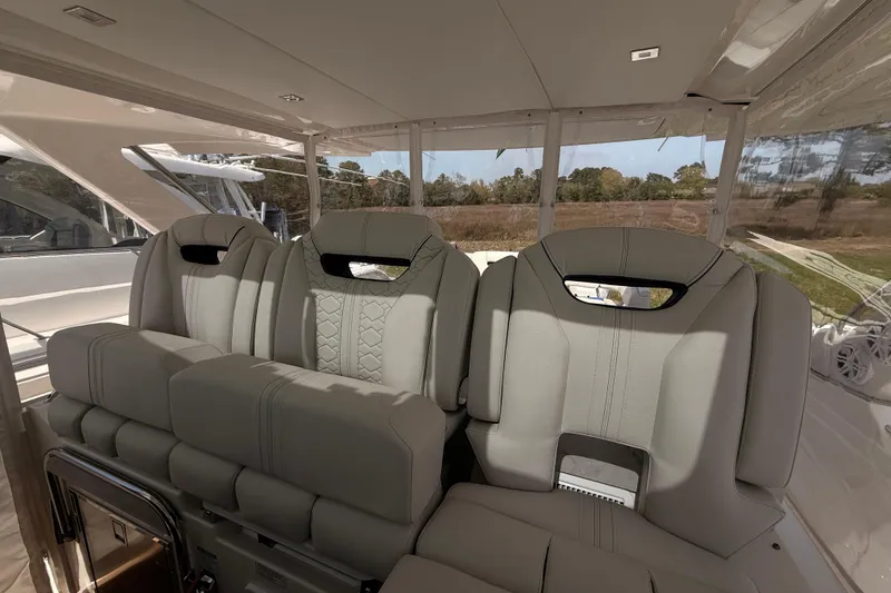 Slide: The Image of Luxurious seating on 2022 Tiara Yachts 38 LS, showcasing elegant design and comfort. - 9