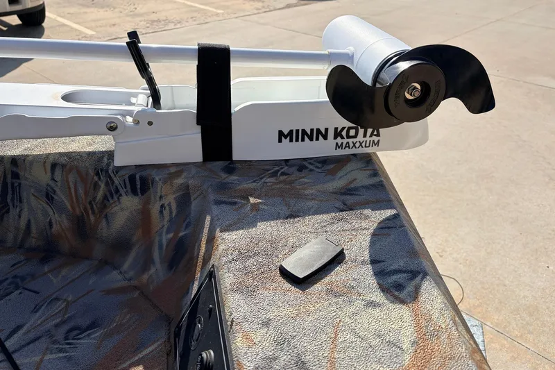 Slide: The Image of Minn Kota Maxxum trolling motor on 2025 Ranger RB210 boat, camo deck. - 14