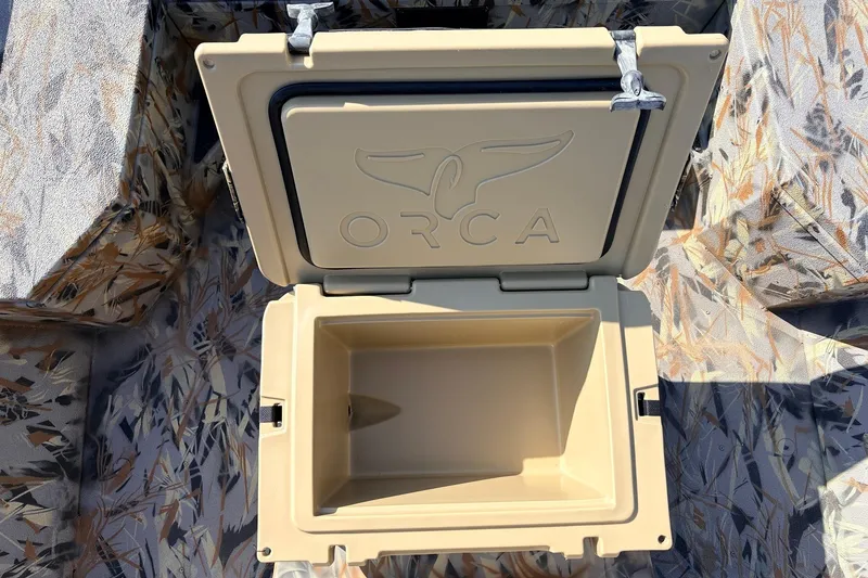 Slide: The Image of Open ORCA cooler on camouflaged Ranger RB210 boat seat, 2025 model. - 30
