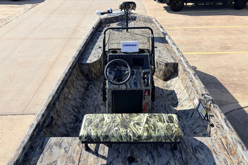 Slide: The Image of 2025 Ranger RB210 boat interior with camouflage design and Lowrance equipment. - 9
