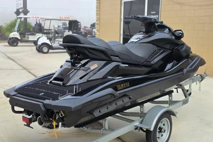 Slide: The Image of 2026 Yamaha WaveRunner FX Limited SVHO on trailer, sleek black design, parked outdoors. - 6