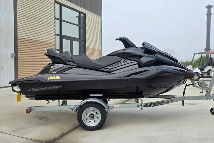 Slide: The Image of 2026 Yamaha WaveRunner FX Limited SVHO on trailer, sleek black design, parked outdoors. - 7