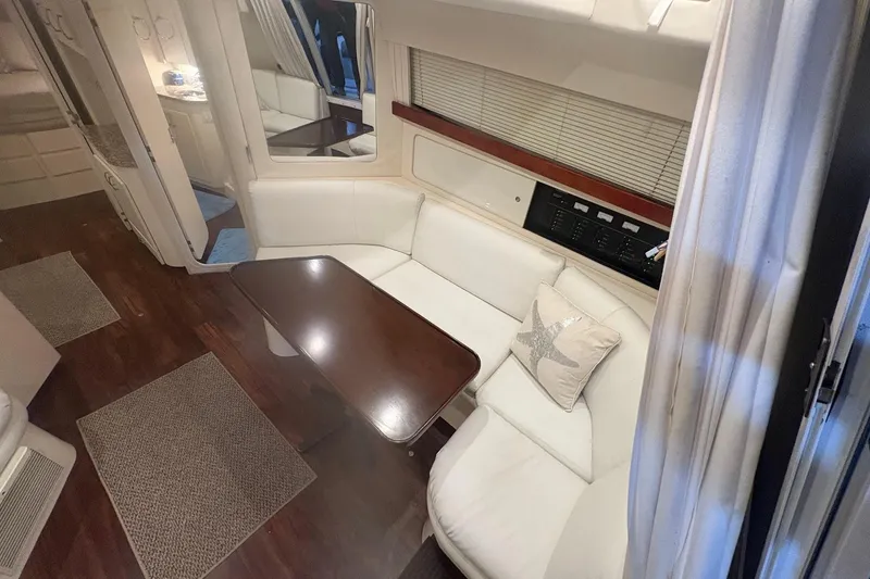 Slide: The Image of 1996 Carver 38 Santego yacht in storage, surrounded by other boats. - 15