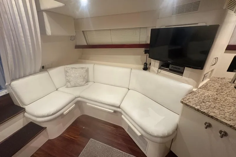 Slide: The Image of 1996 Carver 38 Santego yacht interior kitchen with granite countertops and modern appliances. - 19