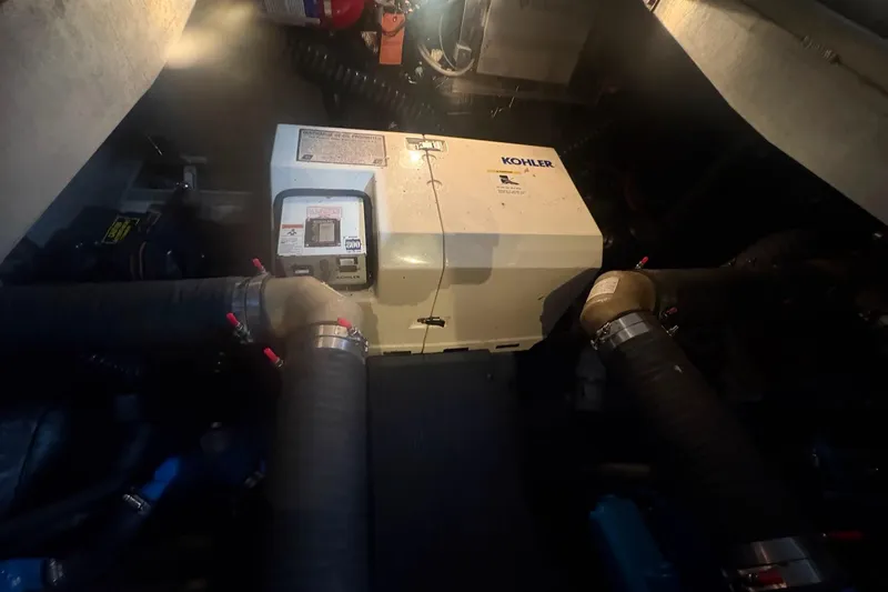 Slide: The Image of 1996 Carver 38 Santego yacht kitchen with granite countertops and stainless steel appliances. - 25