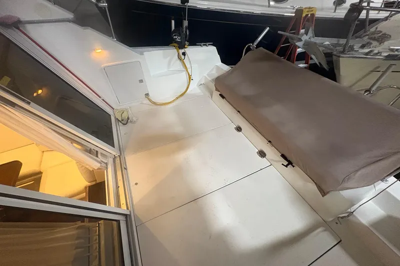 Slide: The Image of 1996 Carver 38 Santego yacht helm with navigation equipment and steering wheel. - 8