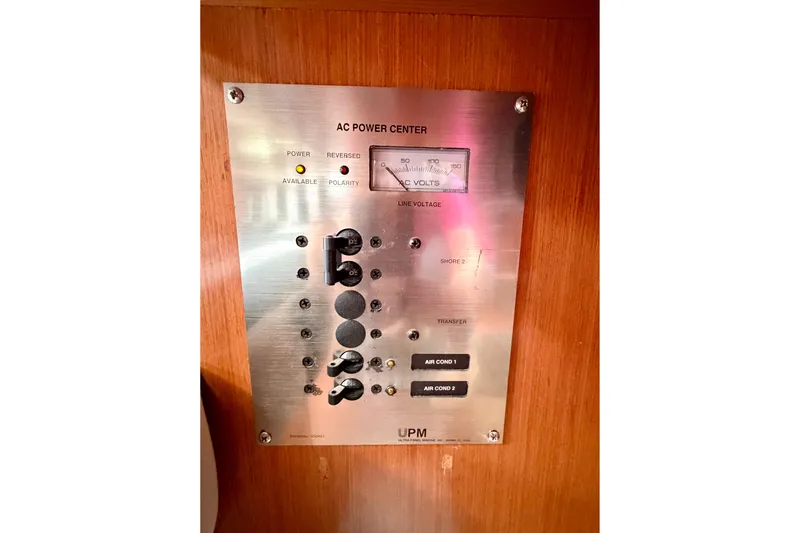 Slide: The Image of AC power control panel on 2008 Beneteau Oceanis 37 sailboat. - 24