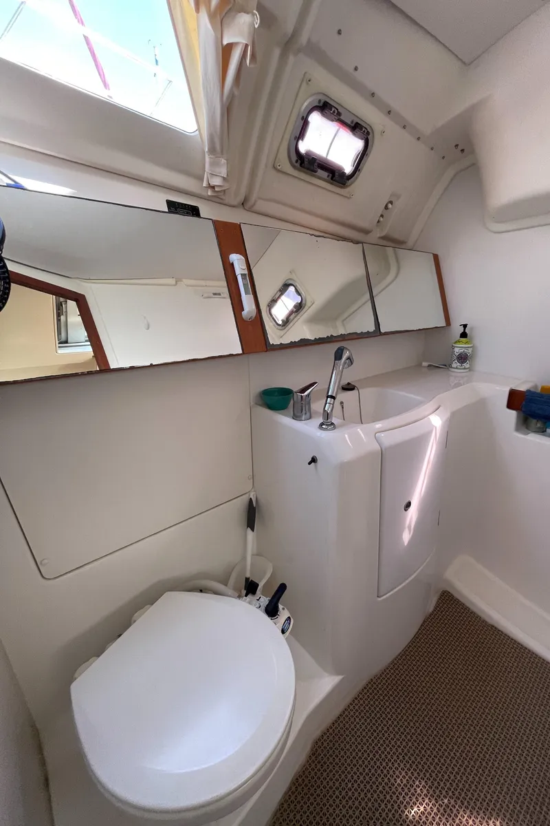 Slide: The Image of Interior of Beneteau Oceanis 37 yacht, bathroom view, year 2008. - 32