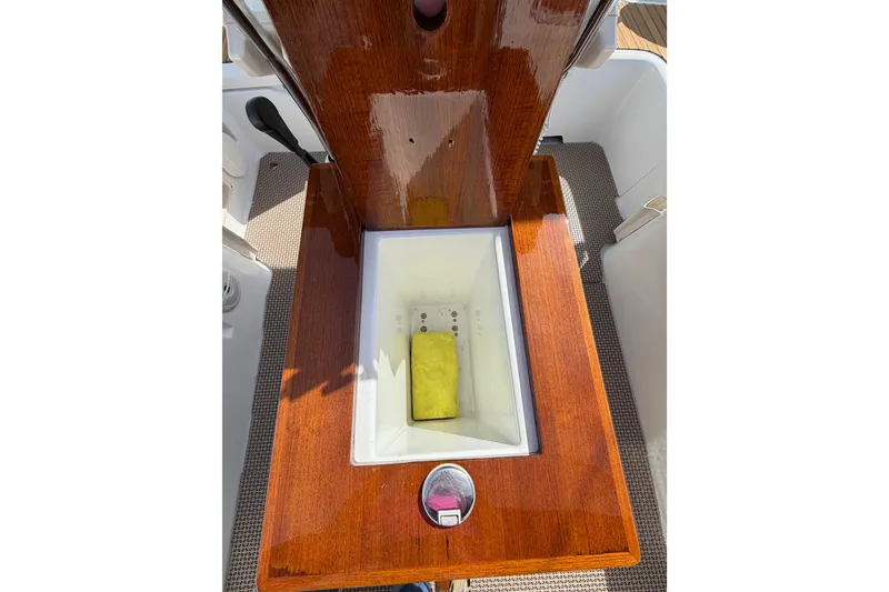 Slide: The Image of Cockpit storage compartment on a 2008 Beneteau Oceanis 37 sailboat. - 41