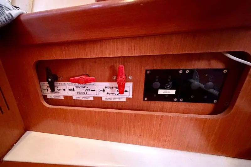Slide: The Image of Battery switches on a 2008 Beneteau Oceanis 37 yacht control panel. - 61