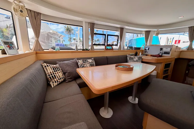 Slide: The Image of Interior of 2017 Lagoon 42 catamaran with cozy seating and modern decor. - 12