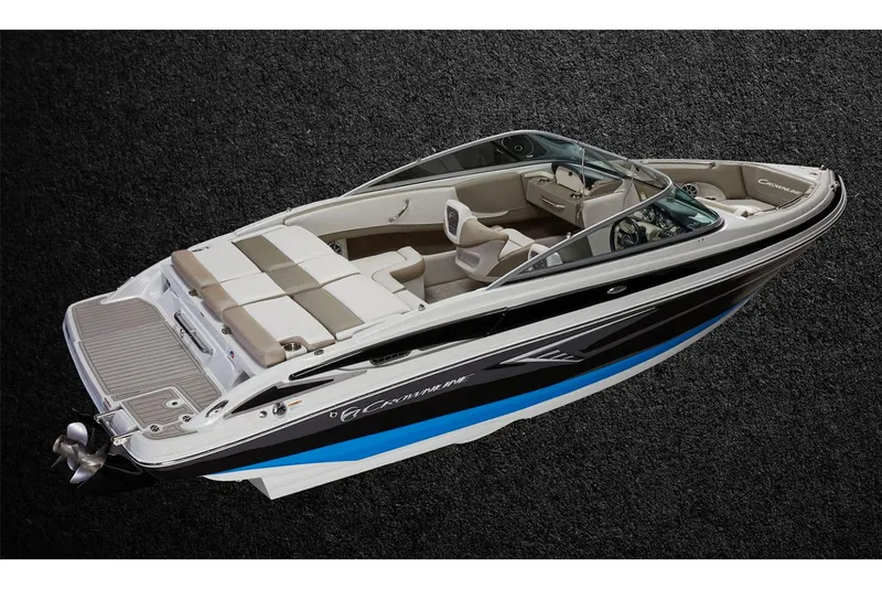 Slide: The Image of Manufacturer Provided Image: 2026 Crownline 220 SS boat with sleek design and spacious seating on dark background. - 2