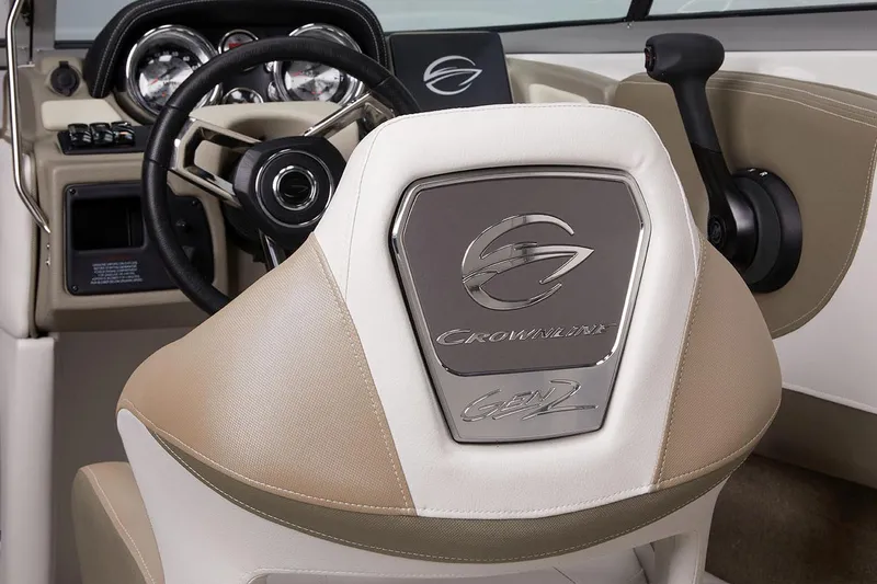 Slide: The Image of Manufacturer Provided Image: 2026 Crownline 220 SS boat interior with beige and white cushioned seating. - 9