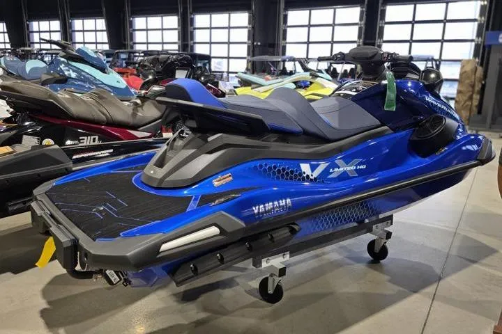 Slide: The Image of 2026 Yamaha WaveRunner VX Limited HO in showroom, blue color, sleek design, on display stand. - 5