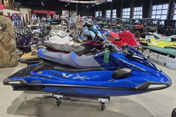 Slide: The Image of 2026 Yamaha WaveRunner VX Limited HO in showroom, blue jet ski on display. - 7