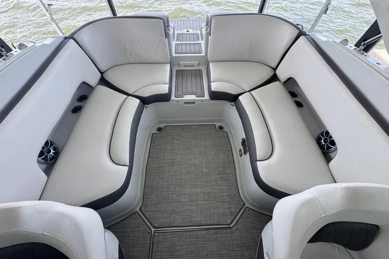 Slide: The Image of 2022 Crownline 265 SS boat interior with spacious seating and modern design. - 13