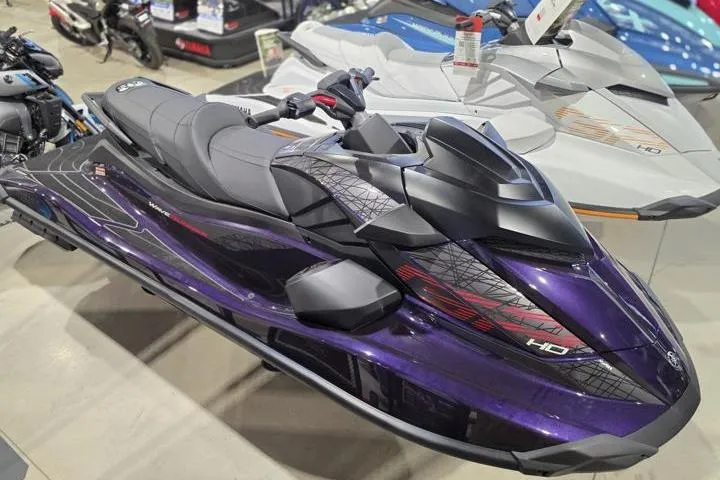 Slide: The Image of 2026 Yamaha WaveRunner GP HO in showroom, sleek design, purple and black color scheme. - 10