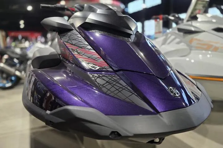Slide: The Image of 2026 Yamaha WaveRunner GP HO in showroom, featuring sleek purple design and modern styling. - 11