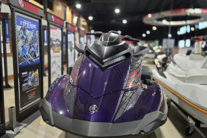 Slide: The Image of 2026 Yamaha WaveRunner GP HO in showroom, featuring sleek purple design and advanced technology. - 12