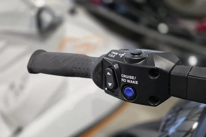 Slide: The Image of Handlebar controls of 2026 Yamaha WaveRunner GP HO, featuring cruise and no wake buttons. - 16