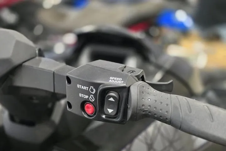 Slide: The Image of Close-up of 2026 Yamaha WaveRunner GP HO handlebar controls with start, stop, and speed adjust buttons. - 17