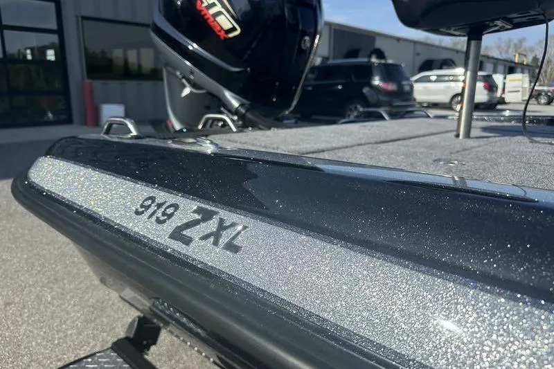 Slide: The Image of 2026 Phoenix 919 ZXL boat with sleek design and metallic finish. - 3