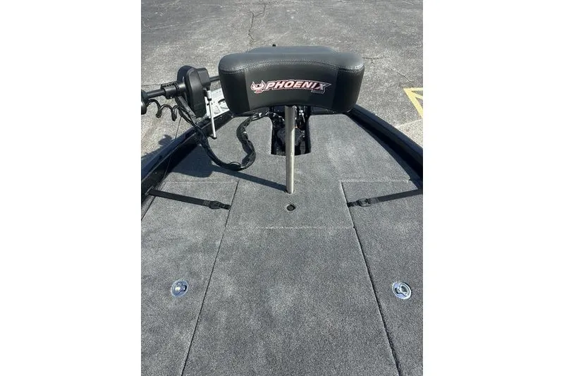 Slide: The Image of 2026 Phoenix 919 ZXL boat deck with seat and motor controls. - 7