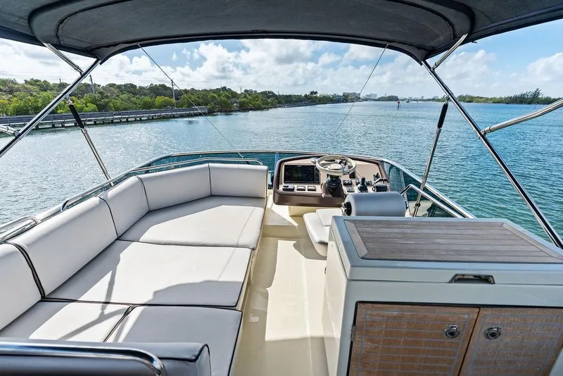 Slide: The Image of Luxurious 2018 Monte Carlo MC 35 yacht interior with scenic waterway view. - 17