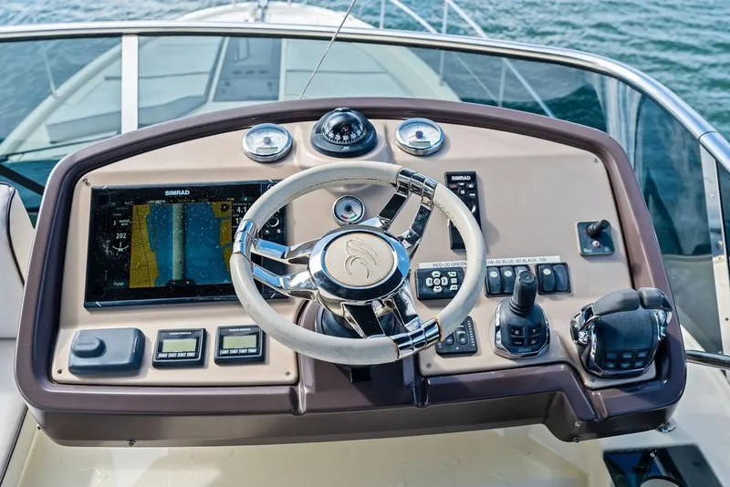 Slide: The Image of Steering console of 2018 Monte Carlo MC 35 yacht with navigation controls and display. - 20
