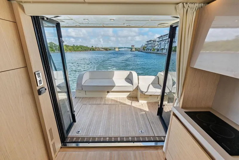 Slide: The Image of Luxurious interior of 2018 Monte Carlo MC 35 yacht with scenic water view. - 27
