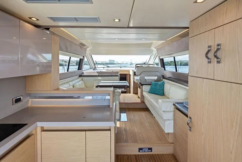 Slide: The Image of Luxurious interior of 2018 Monte Carlo MC 35 yacht with modern design and wood finishes. - 32