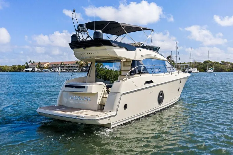 Slide: The Image of Luxury Monte Carlo MC 35 yacht cruising on a sunny day, 2018 model. - 4